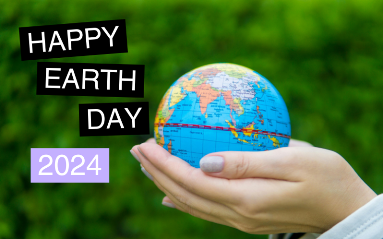 Hands holding a globe with block text saying Happy Earth Day 2024