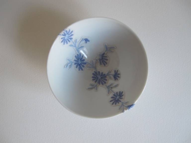 White bowl with blue floral motif.