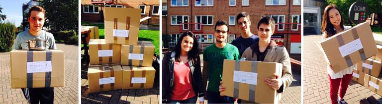 Students with their FORK boxes of preloved kitchenware