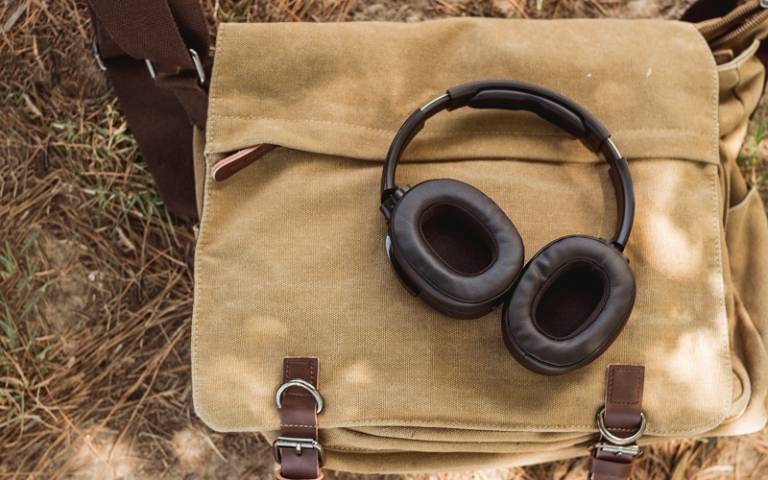 headphones on a bag by Larry George on Unsplash