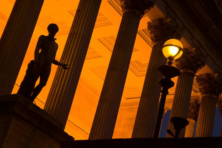 Image of UCL's portico at night