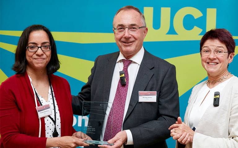 Parama Chaudhury being handed an Enterprise Award by Provost Michael Arthur and Dr Celia Caulcott. Vice-Provost (Enterprise)