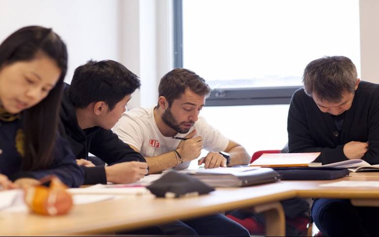 Students discussing in a workshop