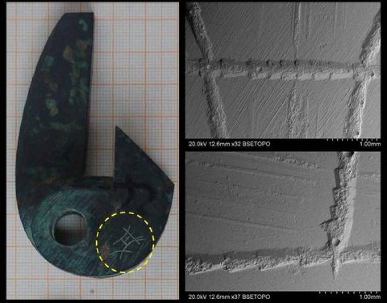Bronze trigger, and details of the surface filing and inscription as seen on silicone rubber impressions observed under the SEM
