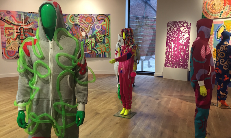 Onsies from 'A Virus Walks into a Bar' on display as part of the CAPSID exhibition at 'Home' in Manchester