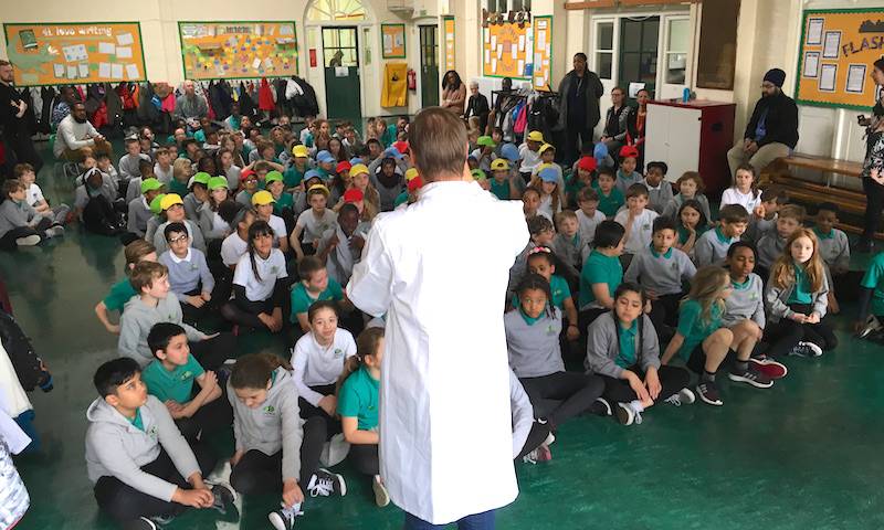 Assembly at Gayhurst Community School. Prof Greg Towers demonstrates herd immunity and vaccination