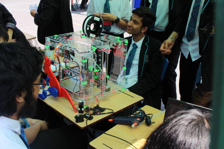 Petchey Academy pupil demonstrating a 3D printer