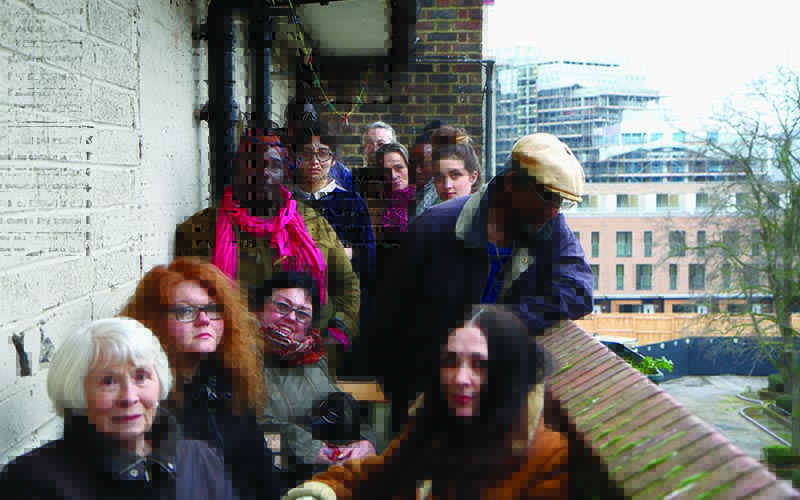 Engaged Urbanism, 'Ninth workshop on the balcony of Samuel House performing the history of public housing in London', Credit: Fugitive Images