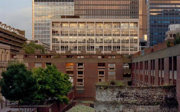 A section of the London Wall in the City of London surrounded by housing blocks