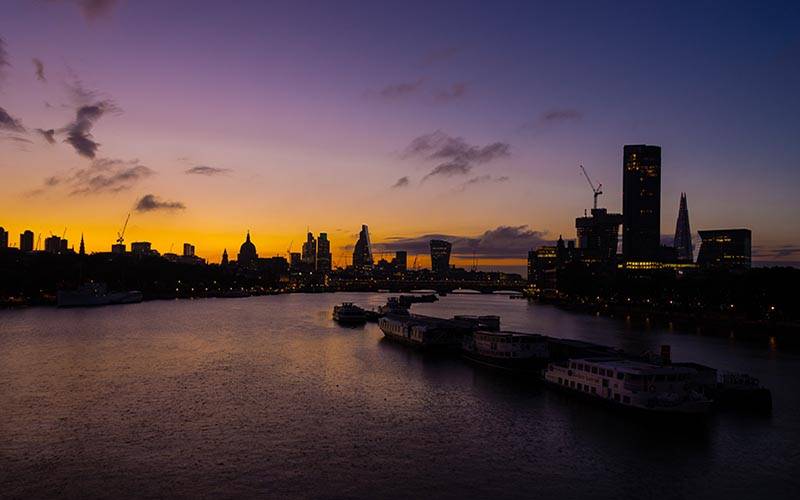 A view of the London skyline from Waterloo Bridge. (Photo by Richard R. Schünemann on Unsplash)