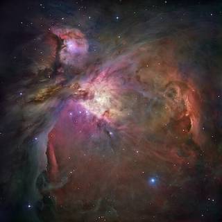 Image of M42 Orion Nebular with bright new stars seen amidst a colourful nursery of gas and dust. Credit: 